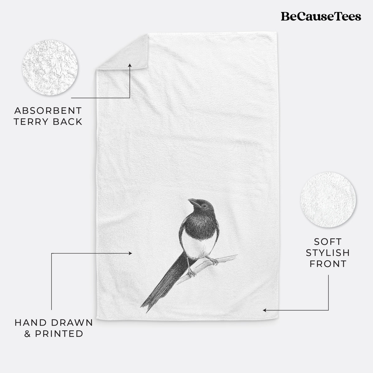 White hand towel printed with a detailed black ink sketch of a black-billed magpie perched on a branch with its long tail.