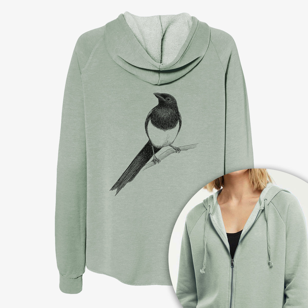 Women's Cali Wave zip-up sweatshirt printed with a detailed black ink sketch of a black-billed magpie perched on a branch with its long tail, with a close-up of the zipper.
