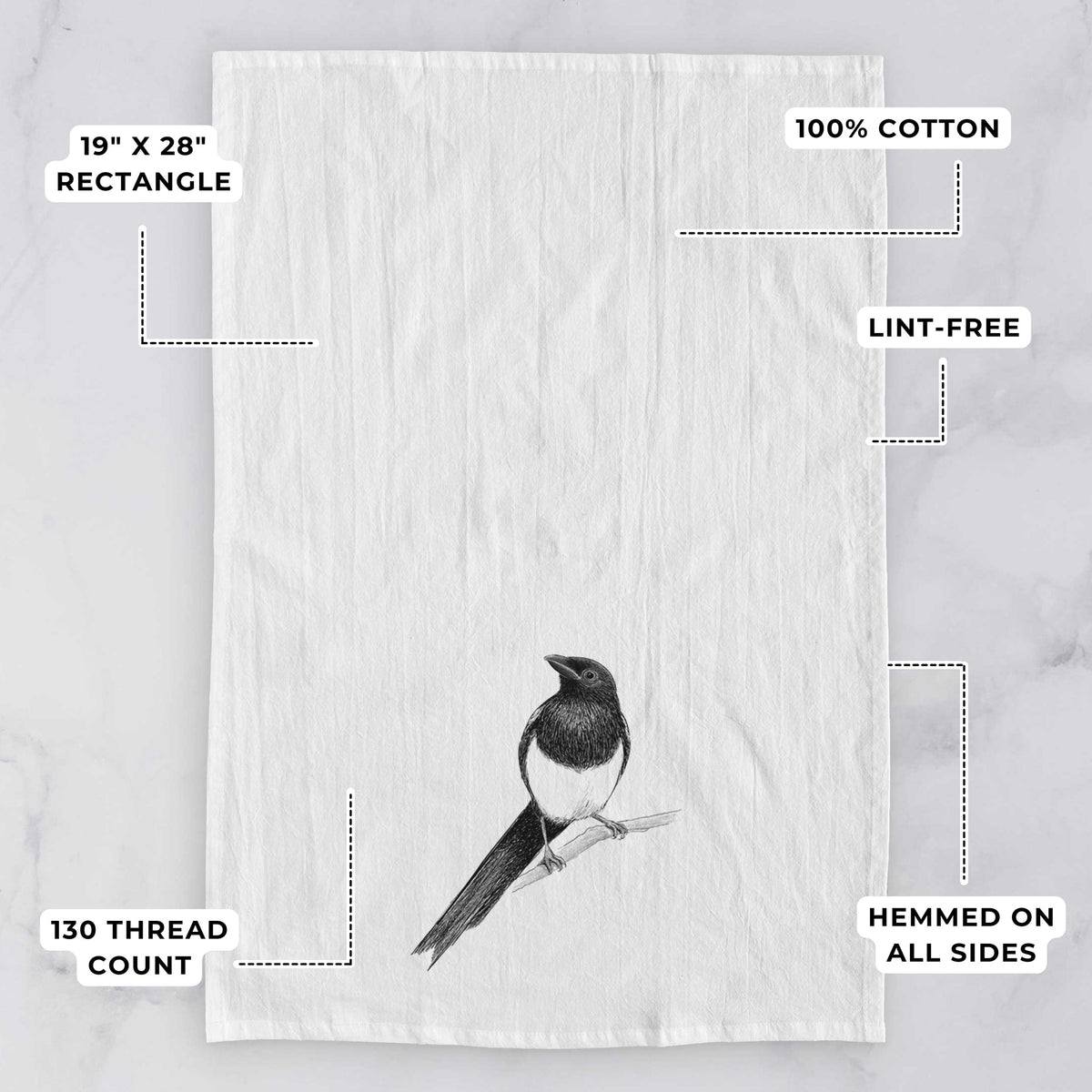 White tea towel printed with a detailed black ink sketch of a black-billed magpie perched on a branch with its long tail, with feature labels: 19 by 28 inch rectangle, 100% cotton, lint-free, 130 thread count, hemmed on all sides.