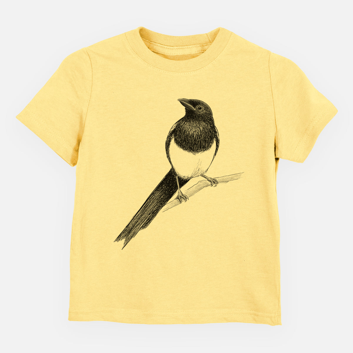 Butter yellow toddler t-shirt laid flat, printed with a detailed black ink sketch of a black-billed magpie perched on a branch with its long tail.