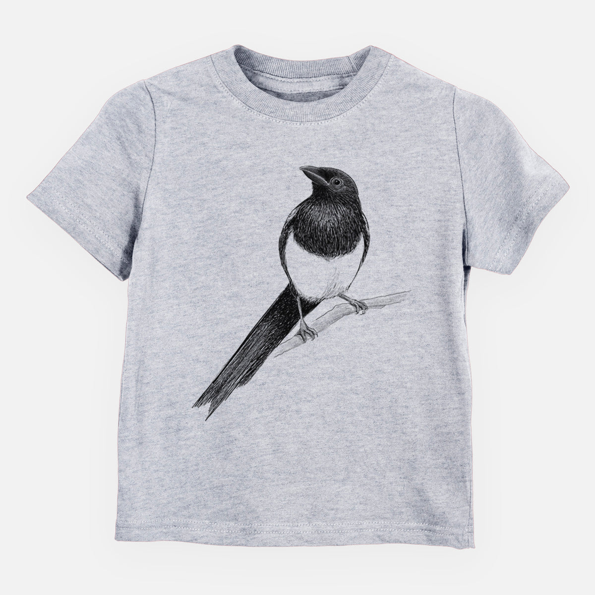 Heather grey toddler t-shirt laid flat, printed with a detailed black ink sketch of a black-billed magpie perched on a branch with its long tail.