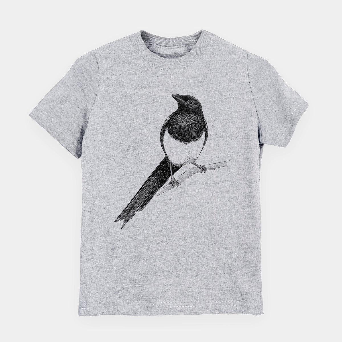 Heather grey youth t-shirt laid flat, printed with a detailed black ink sketch of a black-billed magpie perched on a branch with its long tail.