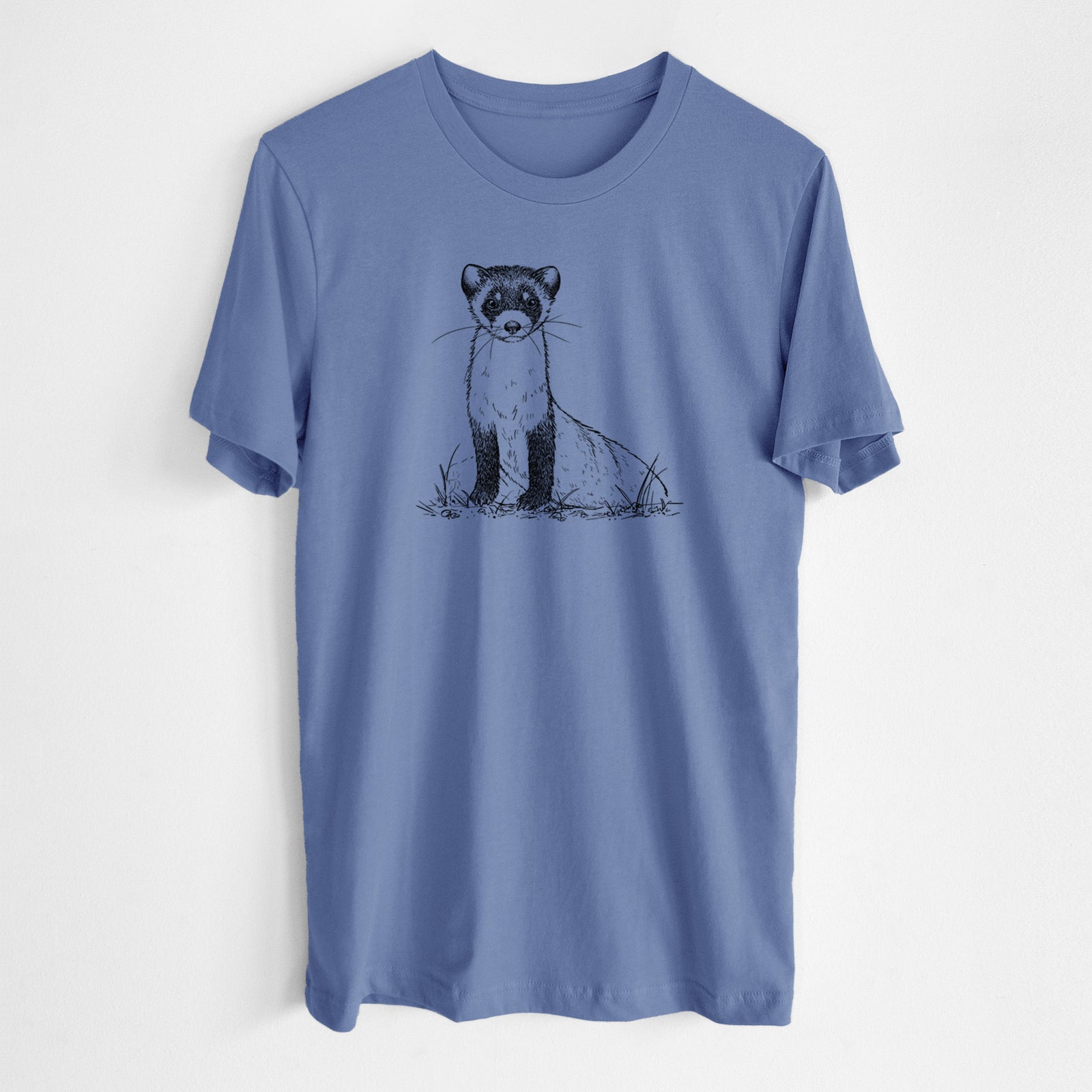 Blue bell lightweight cotton t-shirt laid flat, printed with a detailed black ink illustration of a black-footed ferret sitting on the ground.