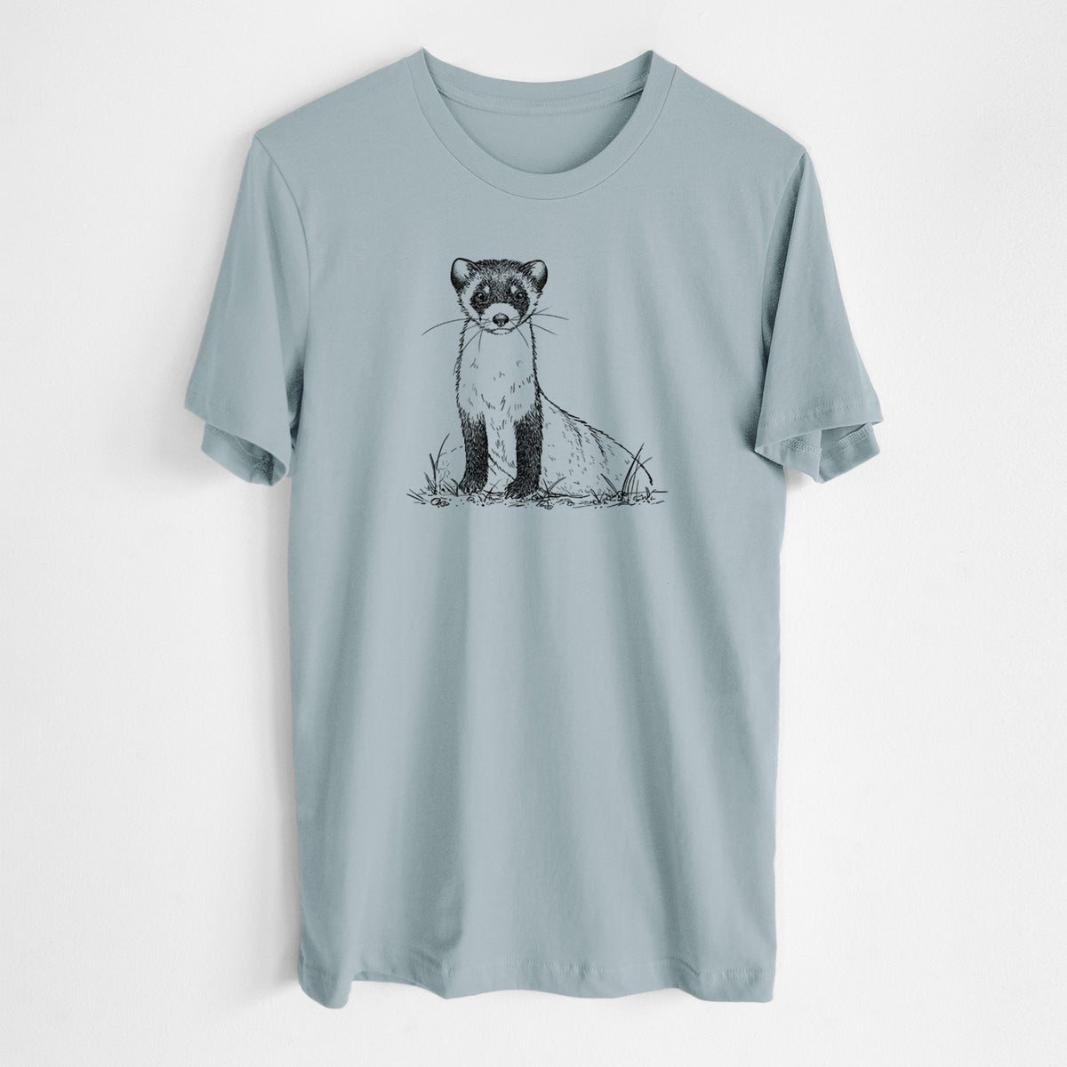 Vintage denim lightweight cotton t-shirt laid flat, printed with a detailed black ink illustration of a black-footed ferret sitting on the ground.