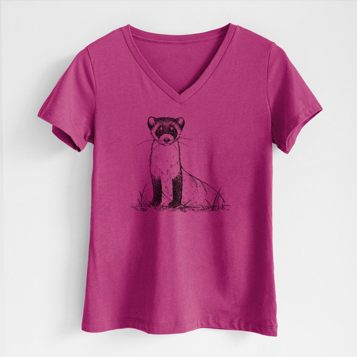 Berry pink women's relaxed fit cotton V-neck t-shirt laid flat, printed with a detailed black ink illustration of a black-footed ferret sitting on the ground.