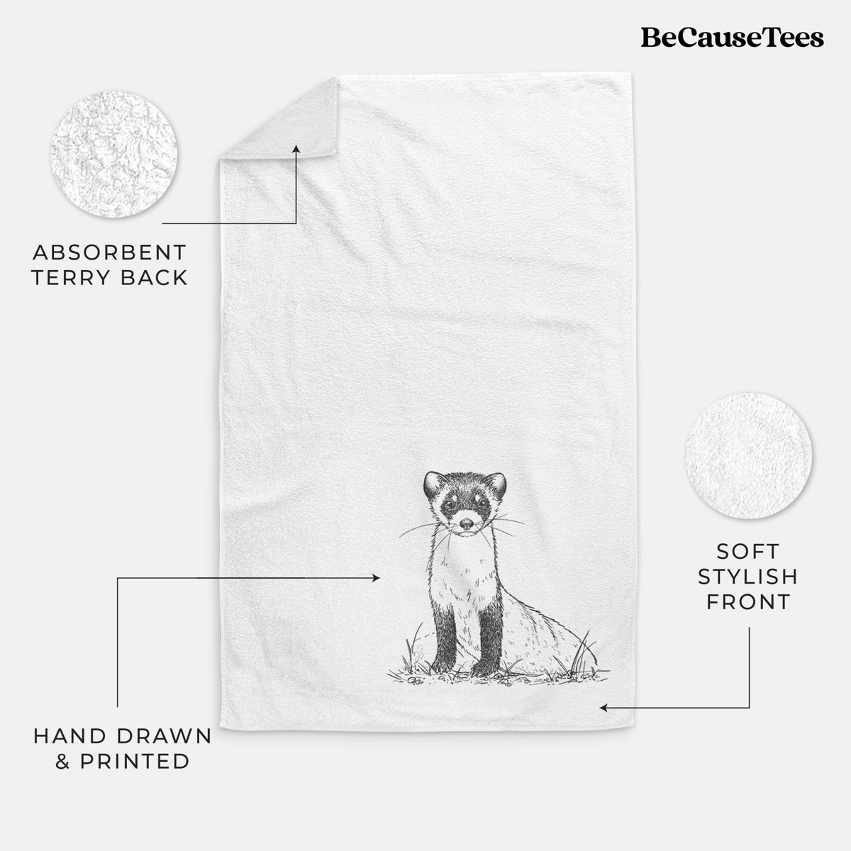 White hand towel printed with a detailed black ink illustration of a black-footed ferret sitting on the ground.