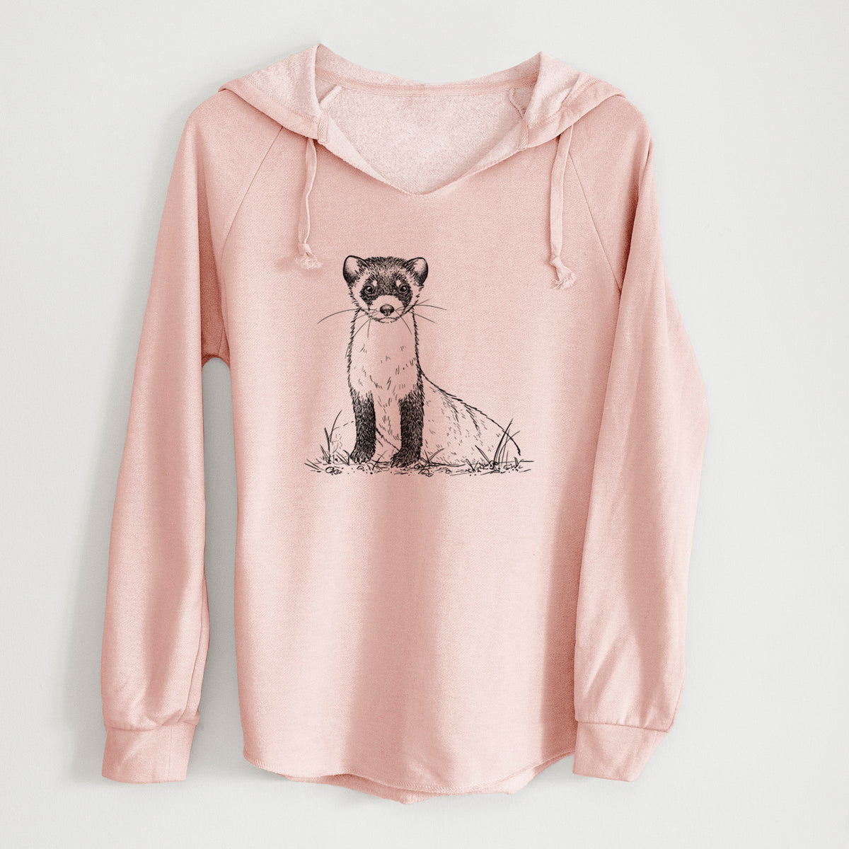 Blush pink women's Cali Wave hooded sweatshirt laid flat, printed with a detailed black ink illustration of a black-footed ferret sitting on the ground.