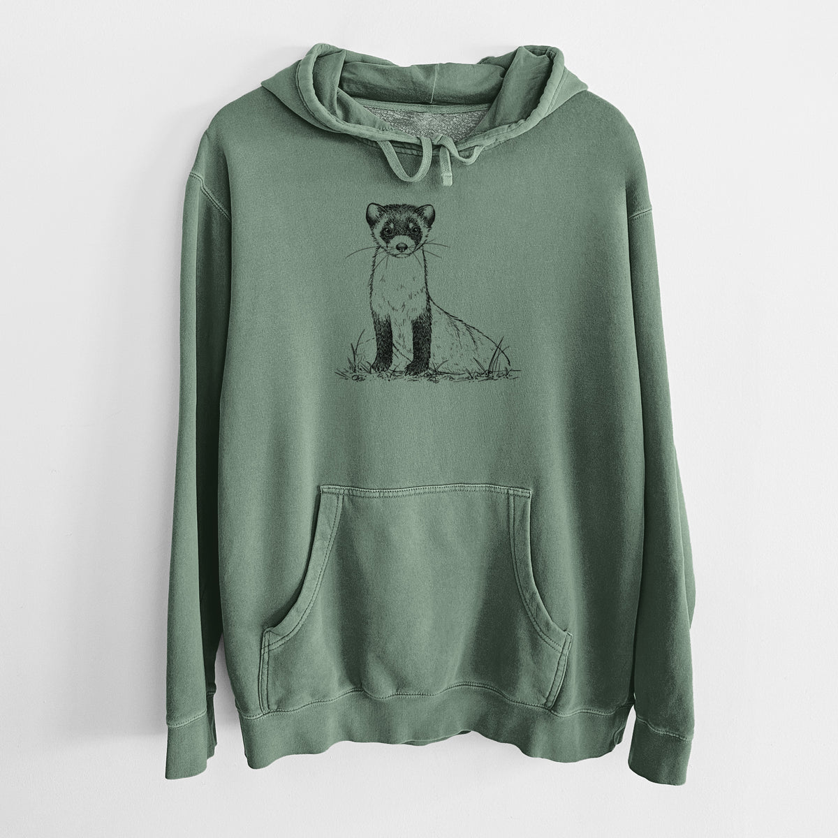 Alpine green pigment dyed hoodie laid flat, printed with a detailed black ink illustration of a black-footed ferret sitting on the ground.