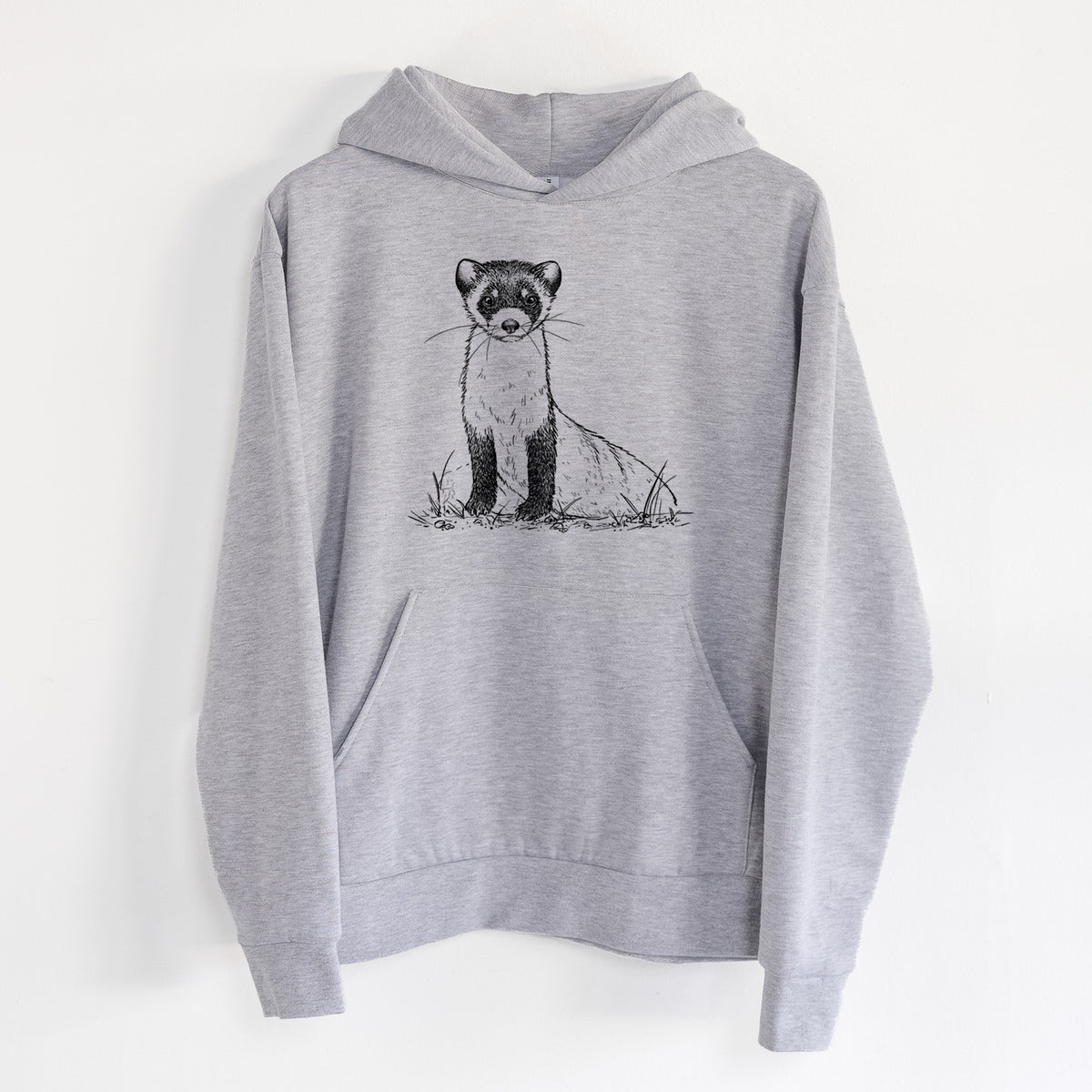 Black-footed Ferret - Mustela nigripes - Statement Midweight Hoodie in Heather Grey, hanging on a white wall, with a front kangaroo pocket and no drawcords.