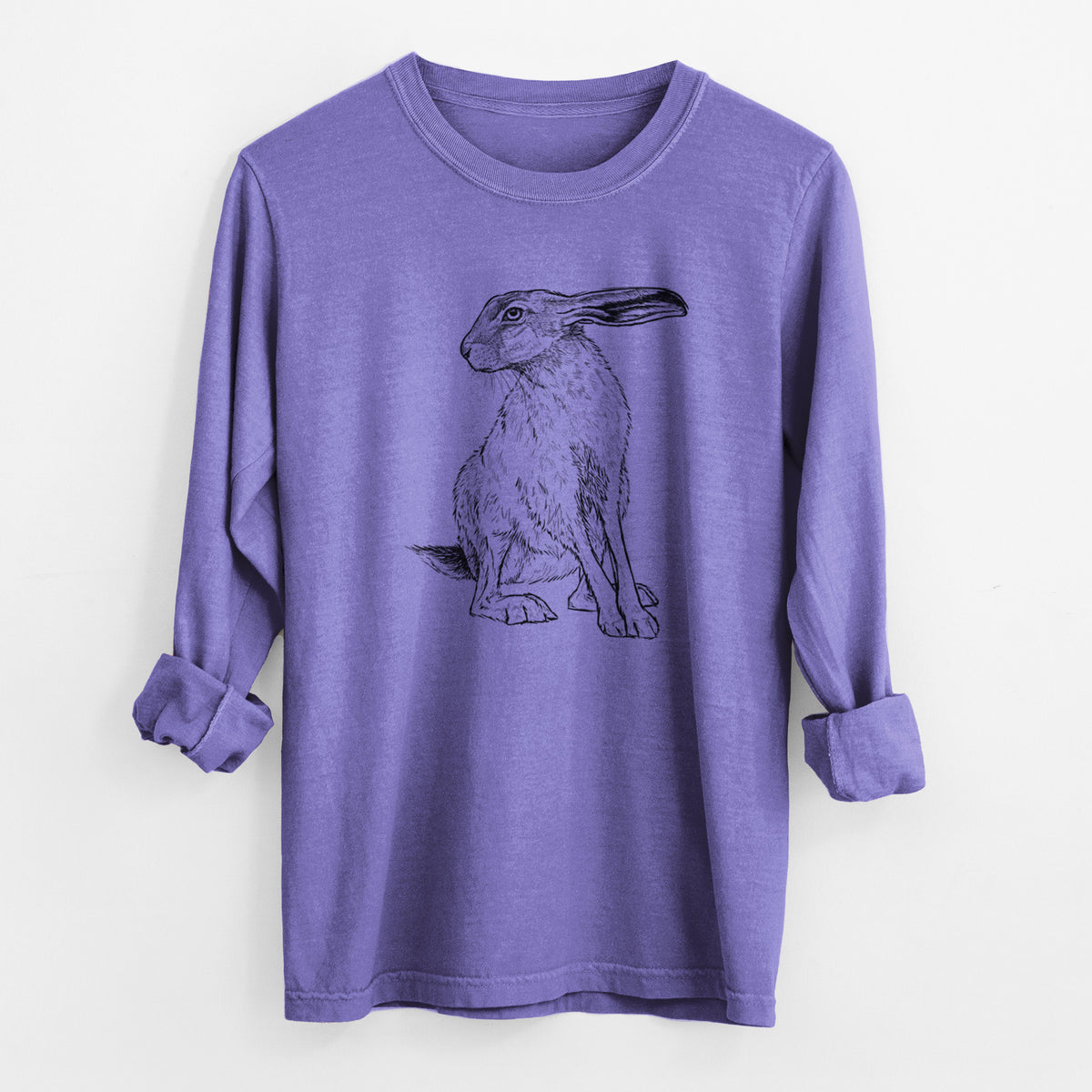 Violet purple Comfort Colors long sleeve shirt laid flat with the cuffs rolled, printed with a detailed black ink illustration of a black-tailed jackrabbit sitting with long upright ears.