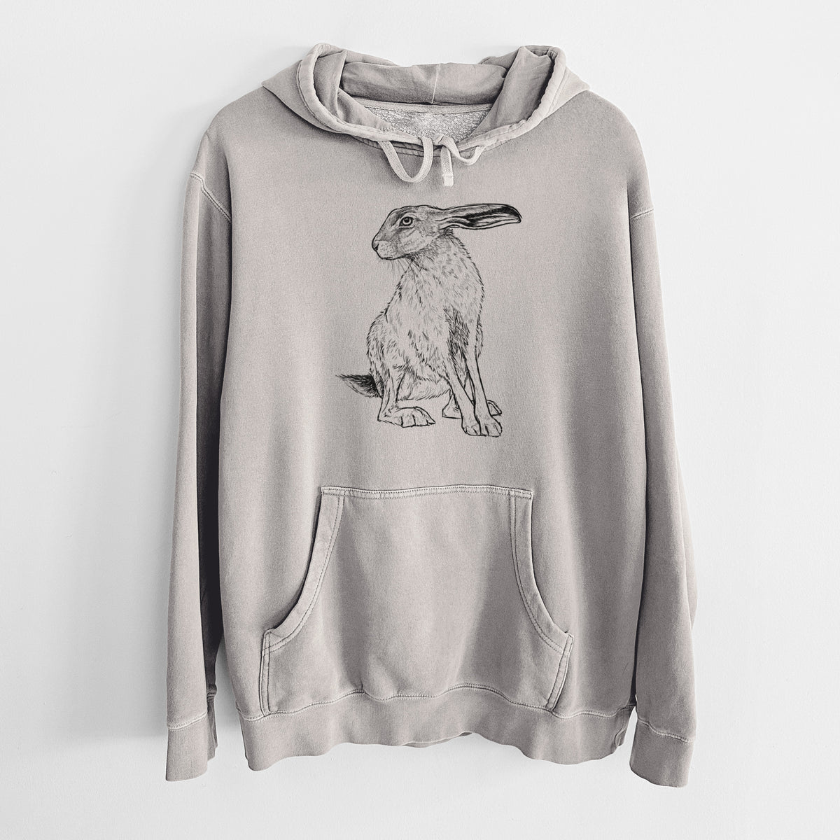 Cement grey pigment dyed hoodie laid flat, printed with a detailed black ink illustration of a black-tailed jackrabbit sitting with long upright ears.