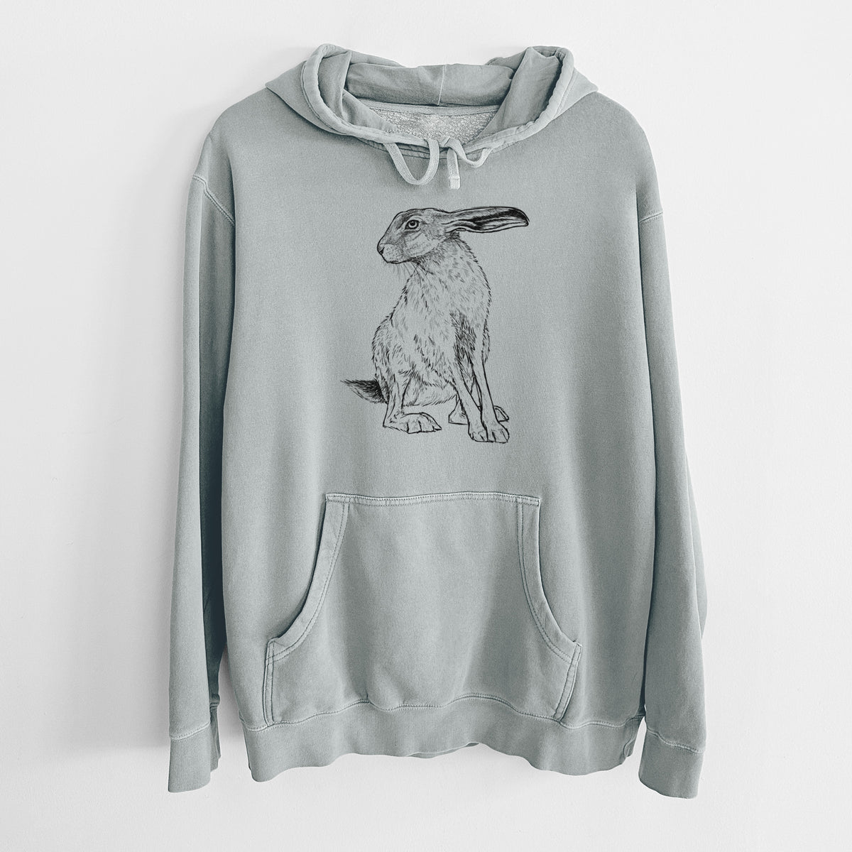 Sage green pigment dyed hoodie laid flat, printed with a detailed black ink illustration of a black-tailed jackrabbit sitting with long upright ears.