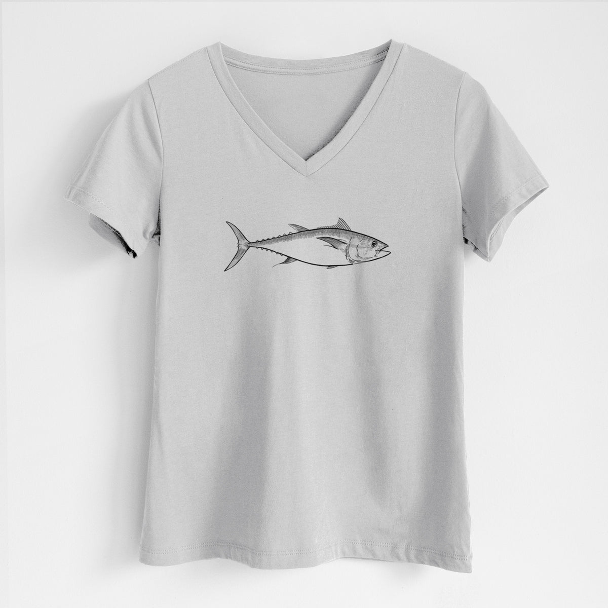 Lunar grey women's relaxed fit cotton V-neck t-shirt laid flat, printed with a black ink line drawing of a bluefin tuna swimming.