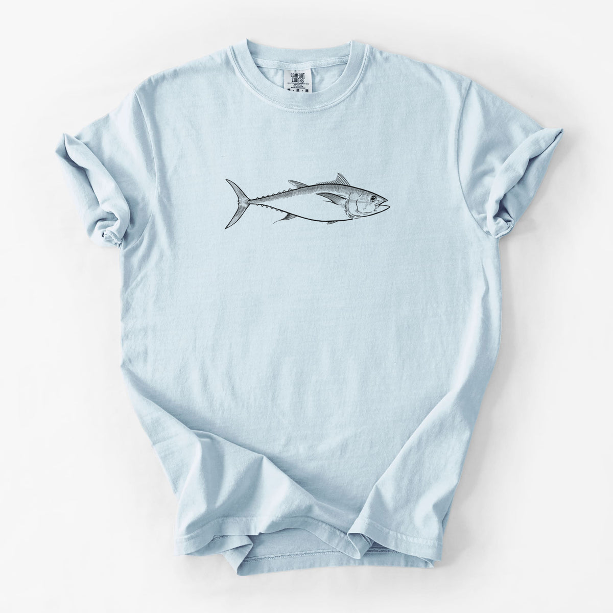 Chambray blue Comfort Colors t-shirt laid flat, printed with a black ink line drawing of a bluefin tuna swimming.