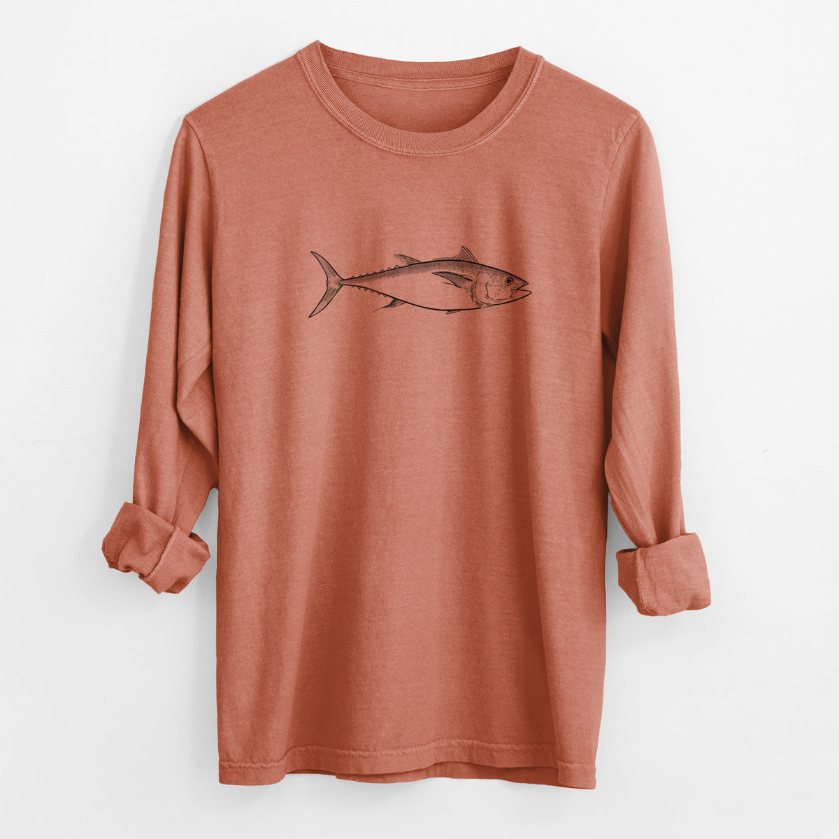 Yam burnt orange Comfort Colors long sleeve shirt laid flat with the cuffs rolled, printed with a black ink line drawing of a bluefin tuna swimming.