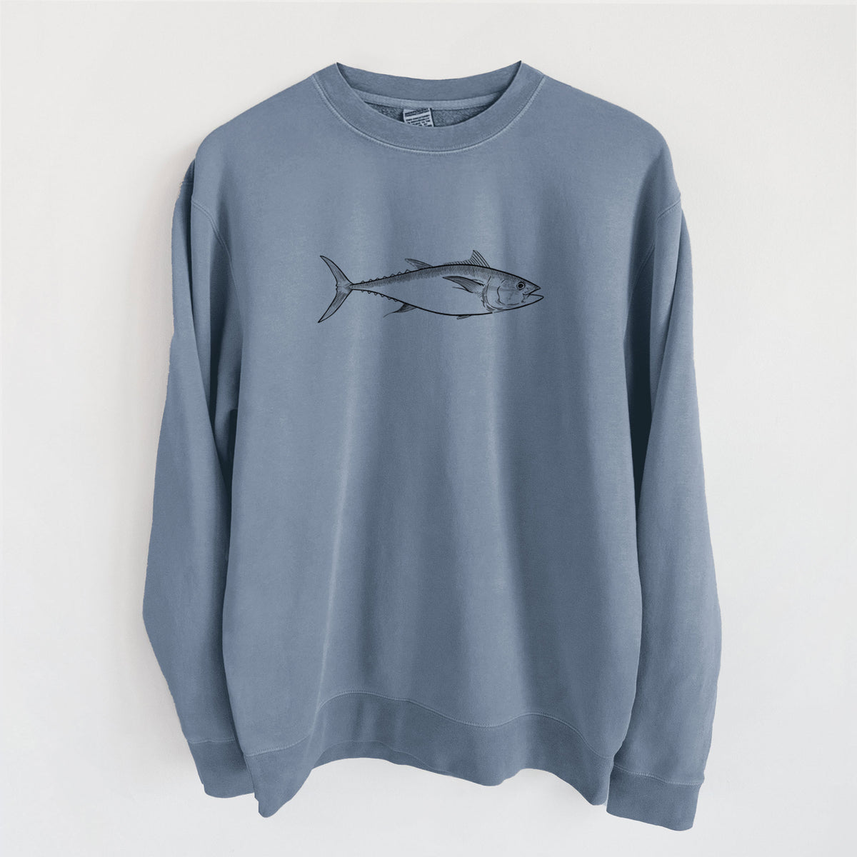 Slate blue pigment dyed crewneck sweatshirt laid flat, printed with a black ink line drawing of a bluefin tuna swimming.
