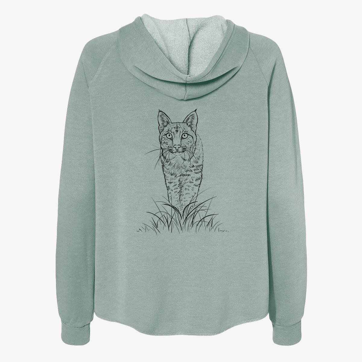 Sage green women's Cali Wave zip-up sweatshirt laid flat, printed with a black ink illustration of a bobcat standing in tall grass, facing forward.