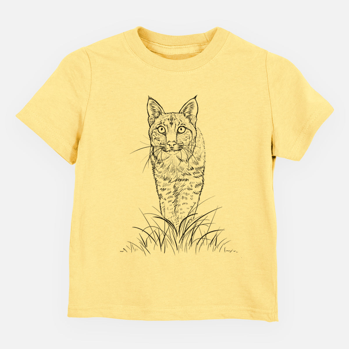Butter yellow toddler t-shirt laid flat, printed with a black ink illustration of a bobcat standing in tall grass, facing forward.