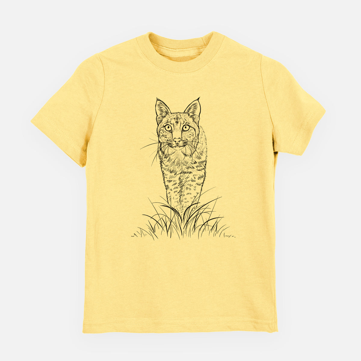 Butter yellow youth t-shirt laid flat, printed with a black ink illustration of a bobcat standing in tall grass, facing forward.