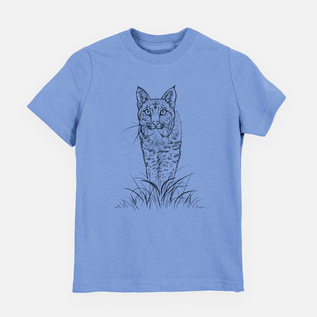 Carolina blue youth t-shirt laid flat, printed with a black ink illustration of a bobcat standing in tall grass, facing forward.