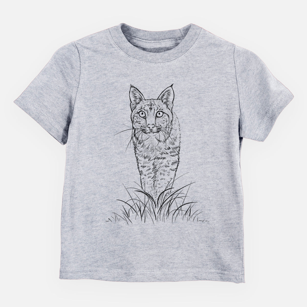 Heather grey toddler t-shirt laid flat, printed with a black ink illustration of a bobcat standing in tall grass, facing forward.