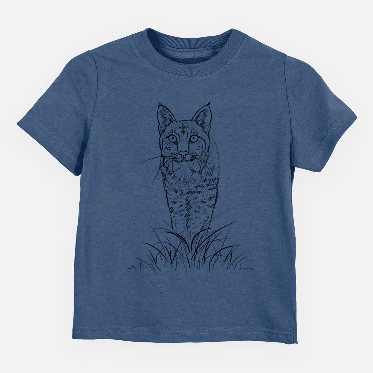 Indigo blue toddler t-shirt laid flat, printed with a black ink illustration of a bobcat standing in tall grass, facing forward.