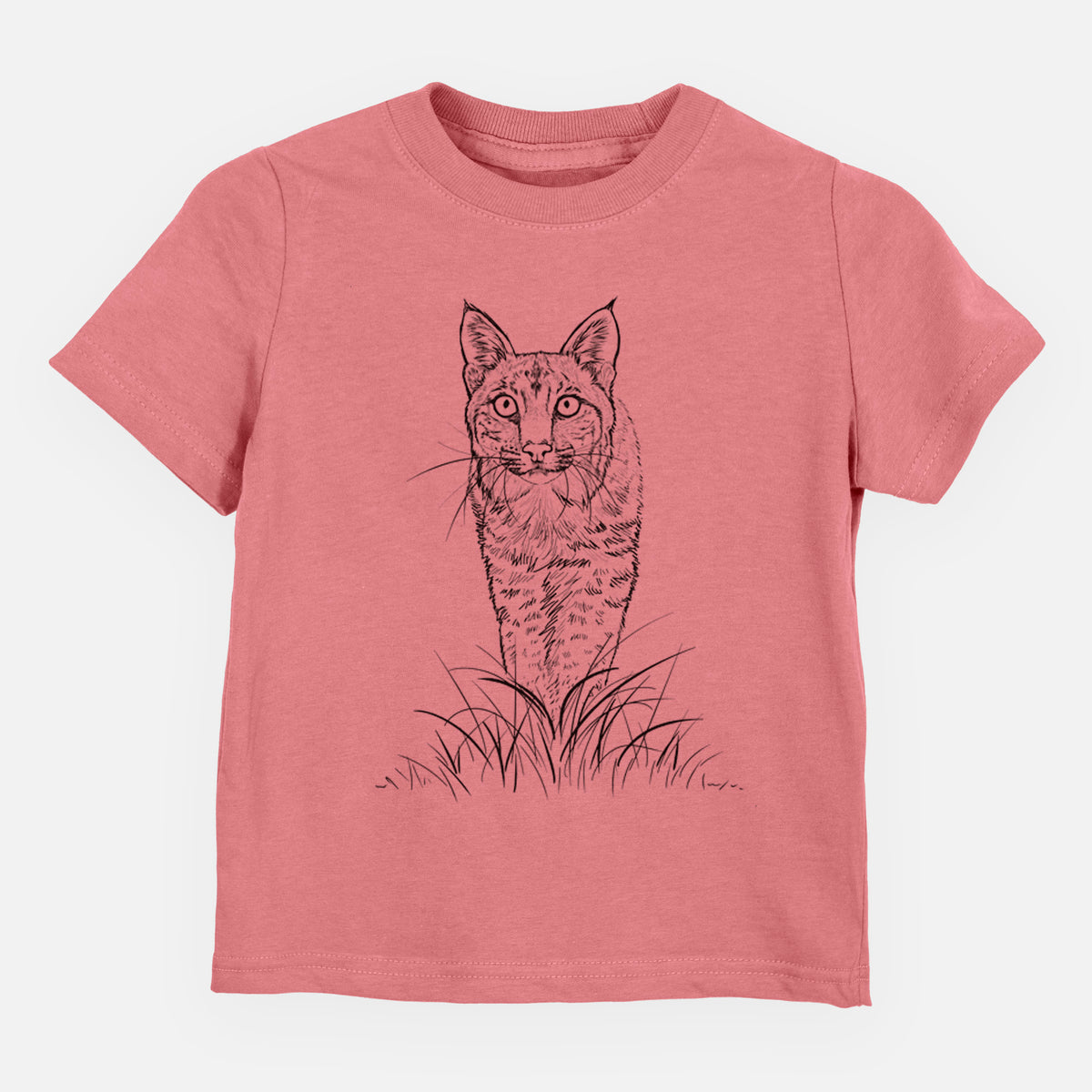 Mauve pink toddler t-shirt laid flat, printed with a black ink illustration of a bobcat standing in tall grass, facing forward.