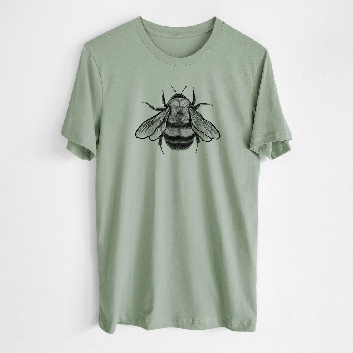 Sage green lightweight cotton t-shirt laid flat, printed with a detailed black ink illustration of a rusty patched bumble bee with its wings spread, seen from above.