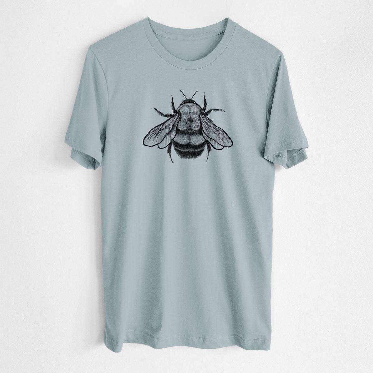 Vintage denim lightweight cotton t-shirt laid flat, printed with a detailed black ink illustration of a rusty patched bumble bee with its wings spread, seen from above.