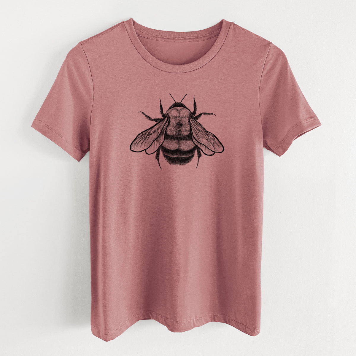 Mauve pink women's relaxed fit cotton t-shirt laid flat, printed with a detailed black ink illustration of a rusty patched bumble bee with its wings spread, seen from above.