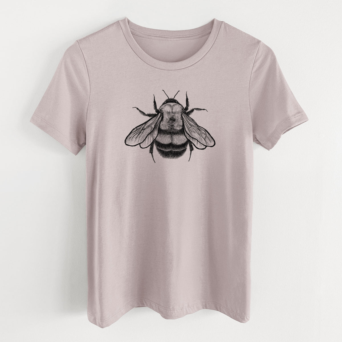 Pink gravel women's relaxed fit cotton t-shirt laid flat, printed with a detailed black ink illustration of a rusty patched bumble bee with its wings spread, seen from above.
