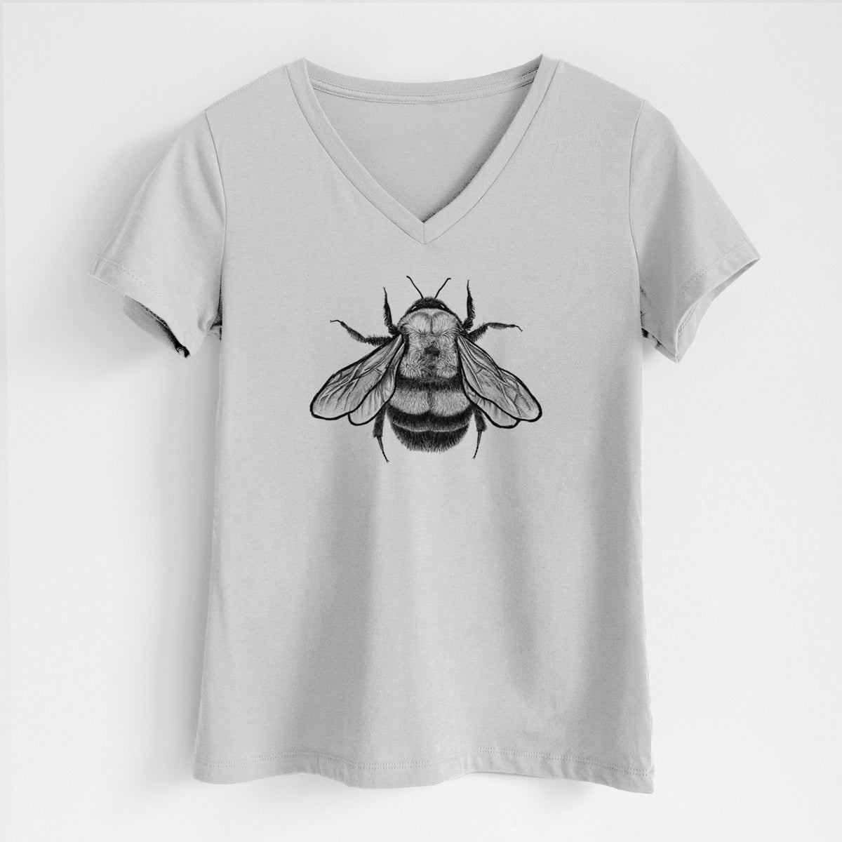 Lunar grey women's relaxed fit cotton V-neck t-shirt laid flat, printed with a detailed black ink illustration of a rusty patched bumble bee with its wings spread, seen from above.