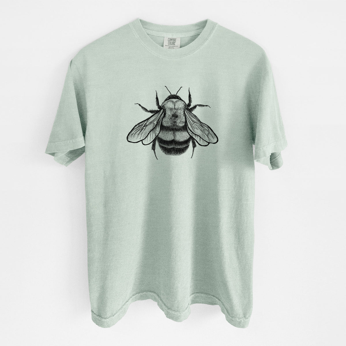 Bay green Comfort Colors t-shirt laid flat, printed with a detailed black ink illustration of a rusty patched bumble bee with its wings spread, seen from above.