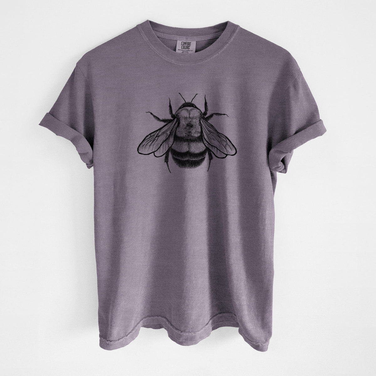 Wine red Comfort Colors t-shirt laid flat, printed with a detailed black ink illustration of a rusty patched bumble bee with its wings spread, seen from above.