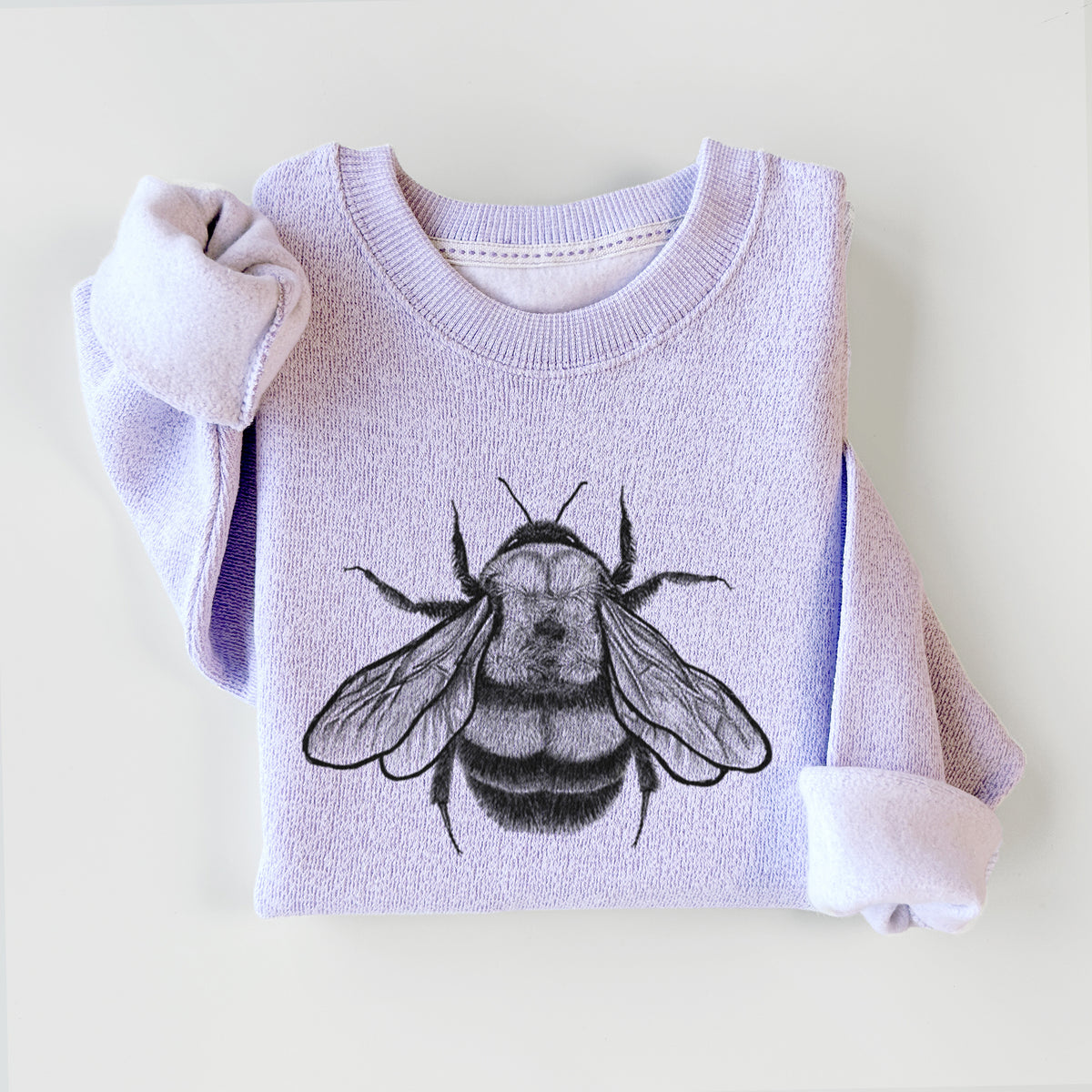 Ice purple knit sweatshirt printed with a detailed black ink illustration of a rusty patched bumble bee with its wings spread, seen from above, styled flat.