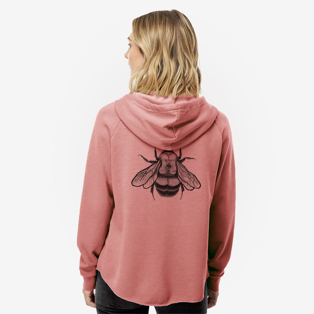 Woman wearing a dusty rose women's Cali Wave zip-up sweatshirt printed with a detailed black ink illustration of a rusty patched bumble bee with its wings spread, seen from above, seen from behind.
