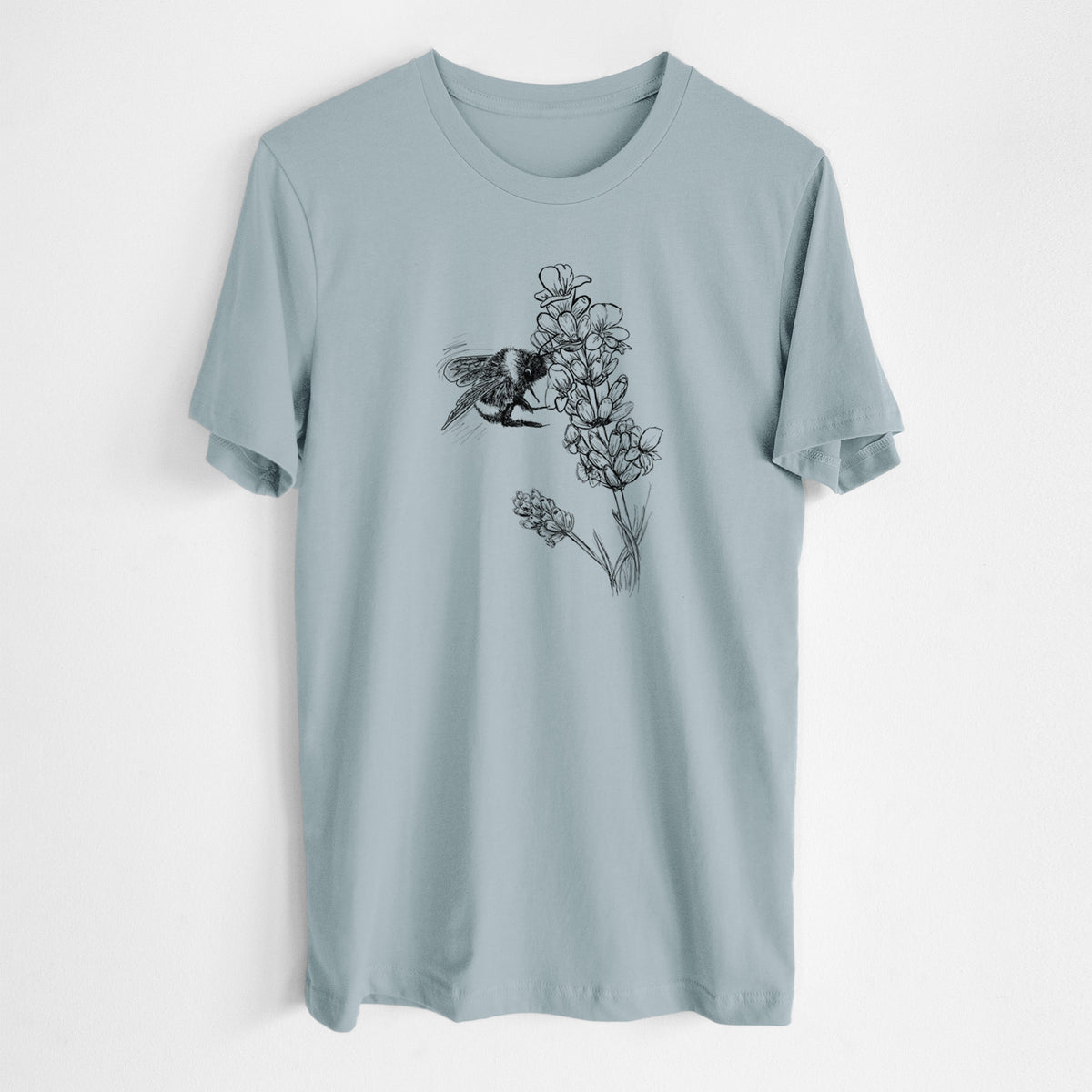 Vintage denim lightweight cotton t-shirt laid flat, printed with a black ink illustration of a bumble bee visiting a sprig of lavender.