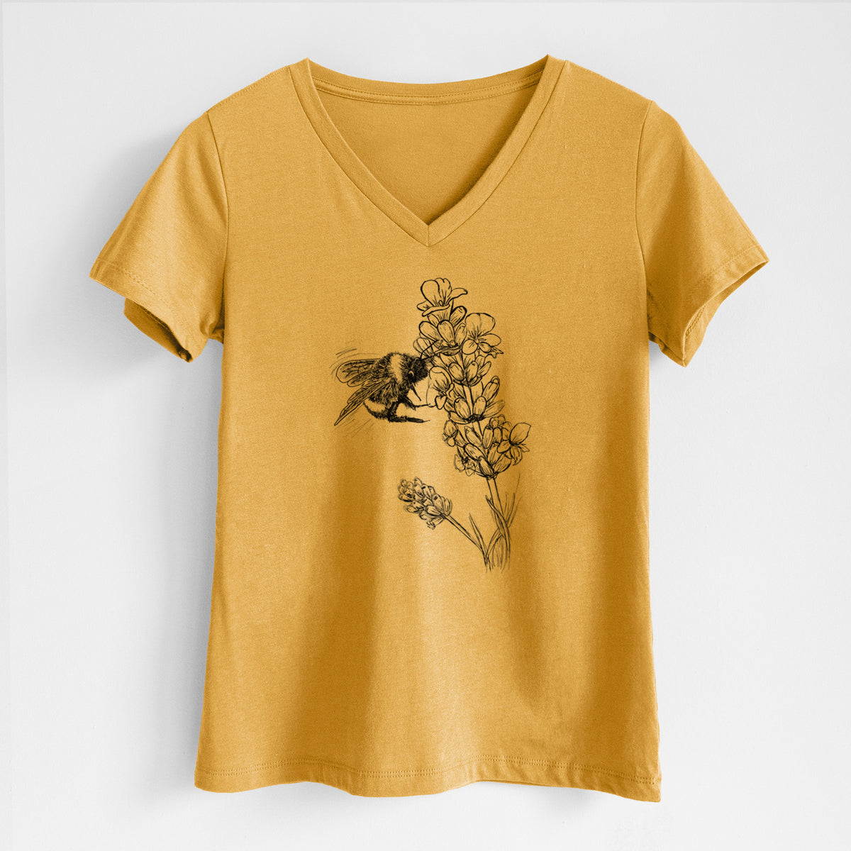 Honeycomb yellow women's relaxed fit cotton V-neck t-shirt laid flat, printed with a black ink illustration of a bumble bee visiting a sprig of lavender.