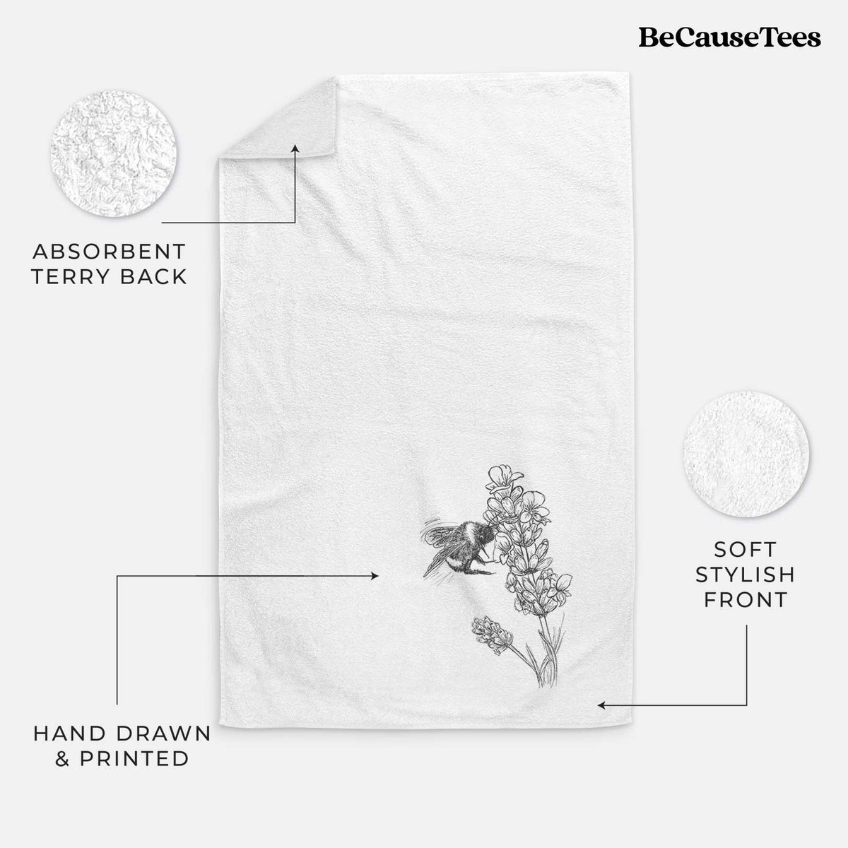 White hand towel printed with a black ink illustration of a bumble bee visiting a sprig of lavender.