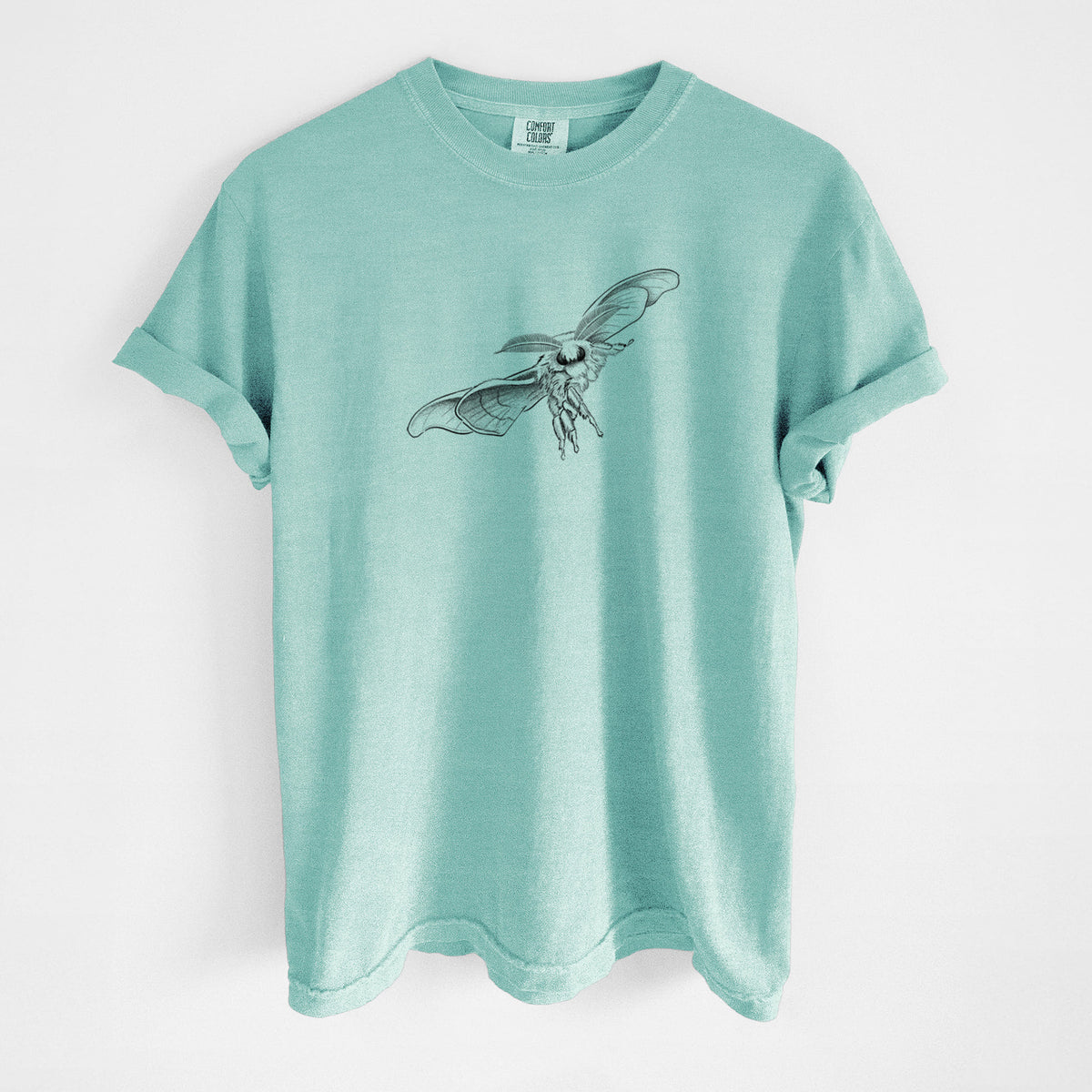 Chalky mint Comfort Colors t-shirt laid flat, printed with a black ink illustration of a silk moth with its wings spread.