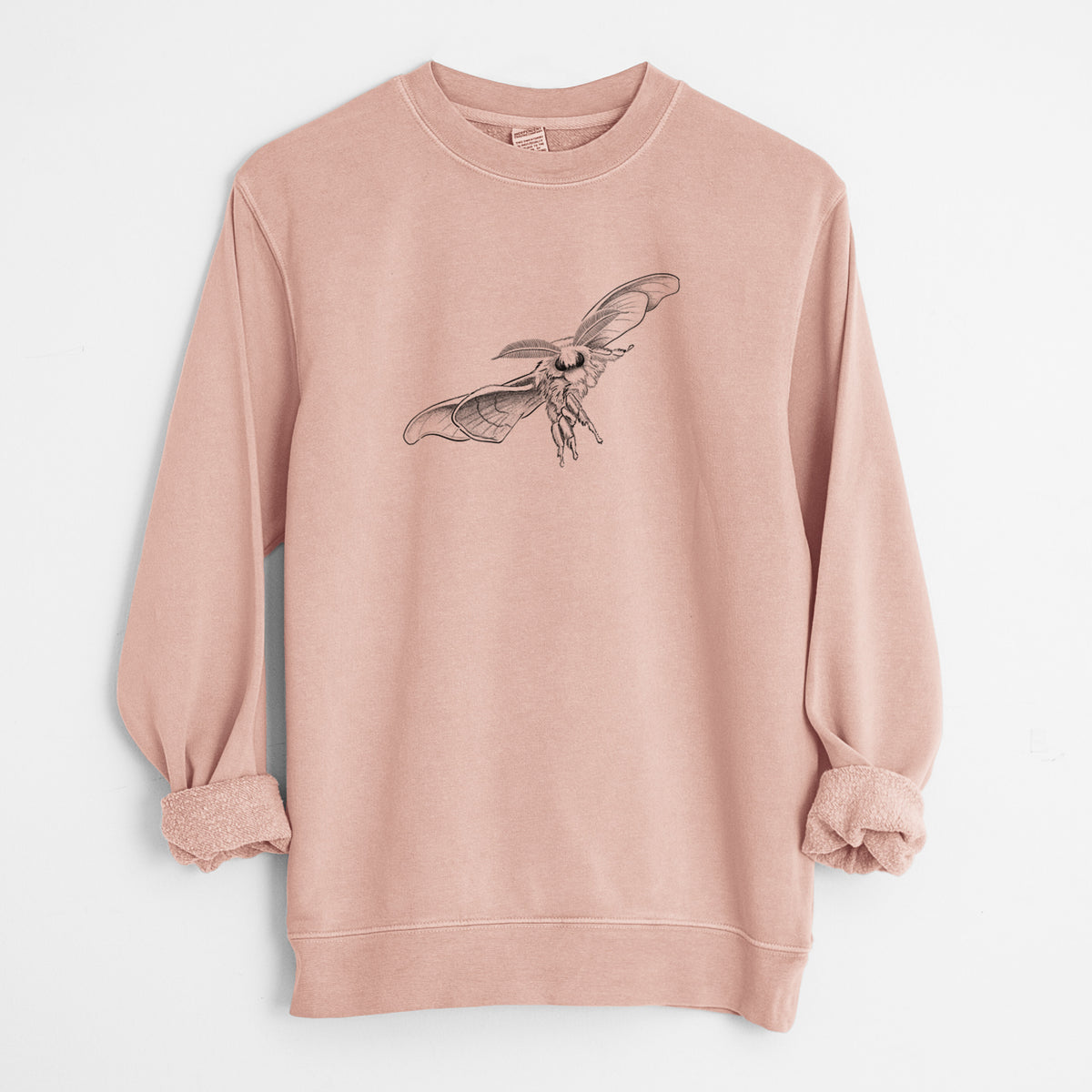 Dusty pink pigment dyed crewneck sweatshirt laid flat with the sleeves rolled, printed with a black ink illustration of a silk moth with its wings spread.