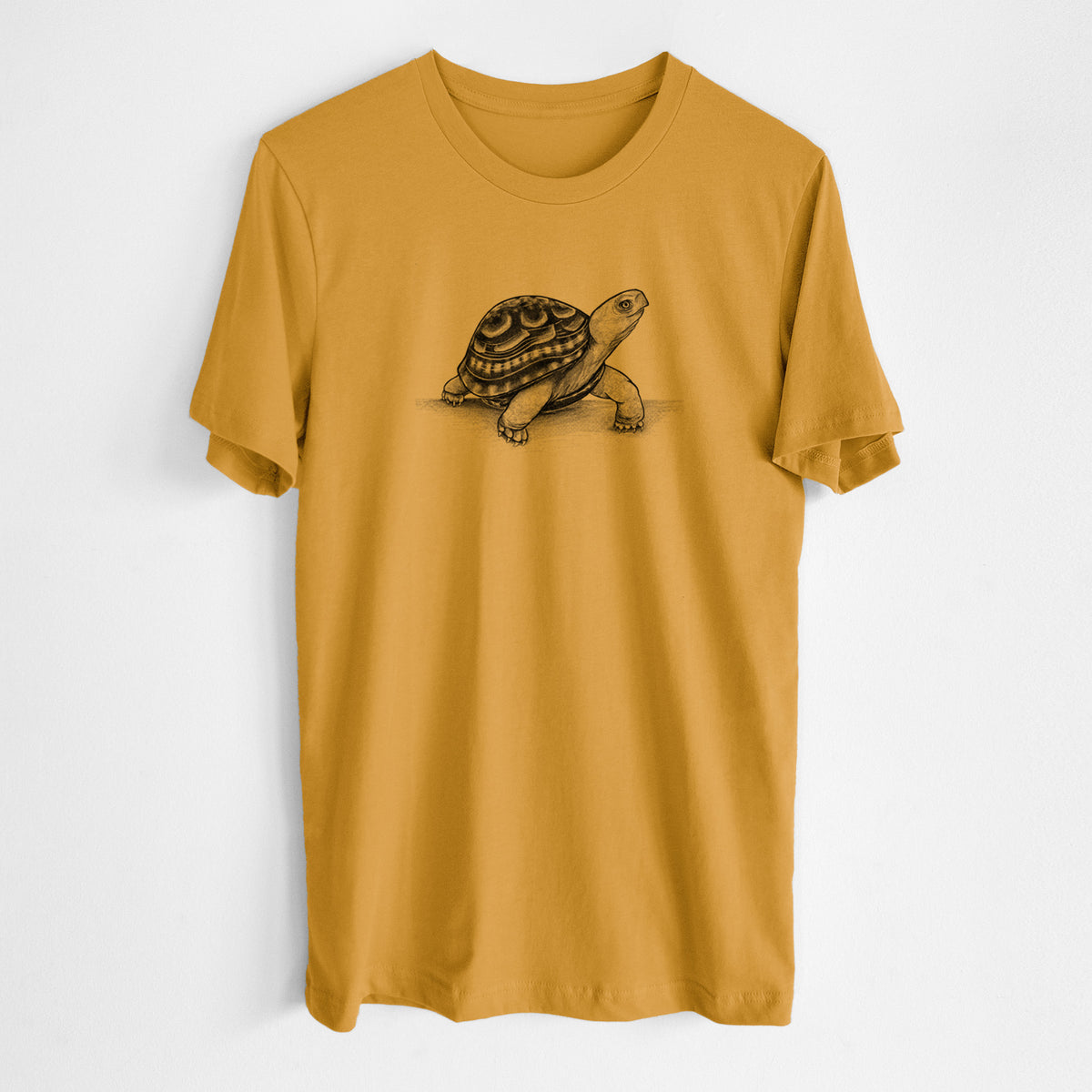 Honeycomb yellow lightweight cotton t-shirt laid flat, printed with a detailed black ink illustration of an eastern box turtle walking.