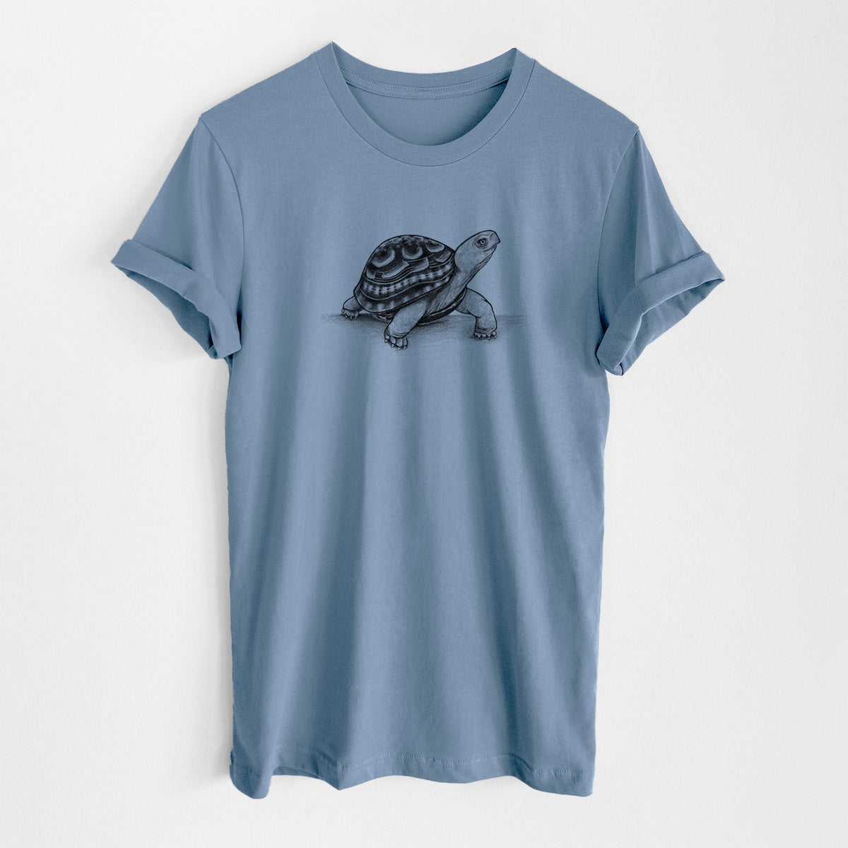 Steel blue lightweight cotton t-shirt laid flat, printed with a detailed black ink illustration of an eastern box turtle walking.