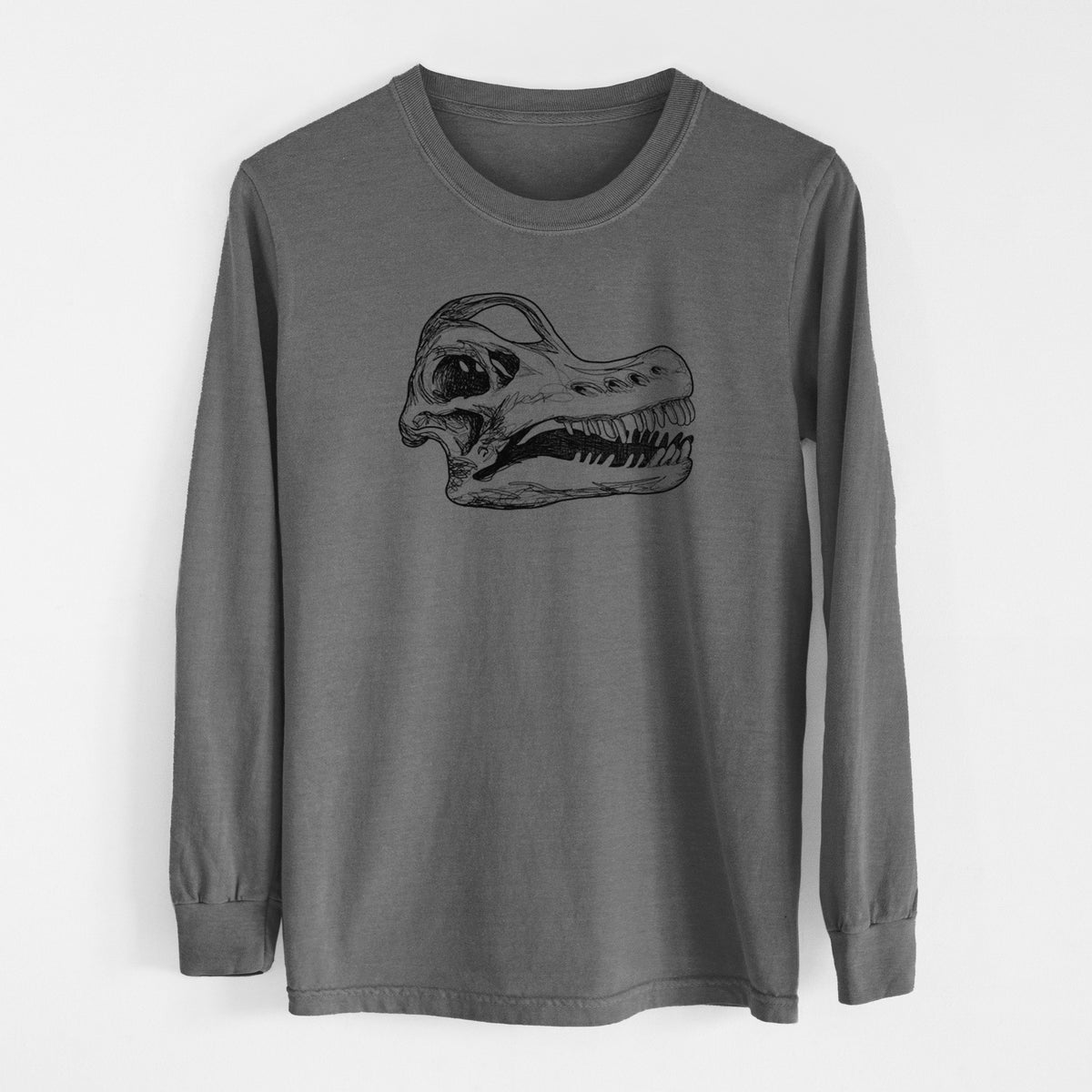 Pepper Comfort Colors long sleeve shirt laid flat, printed with a detailed black ink illustration of a Brachiosaurus skull.
