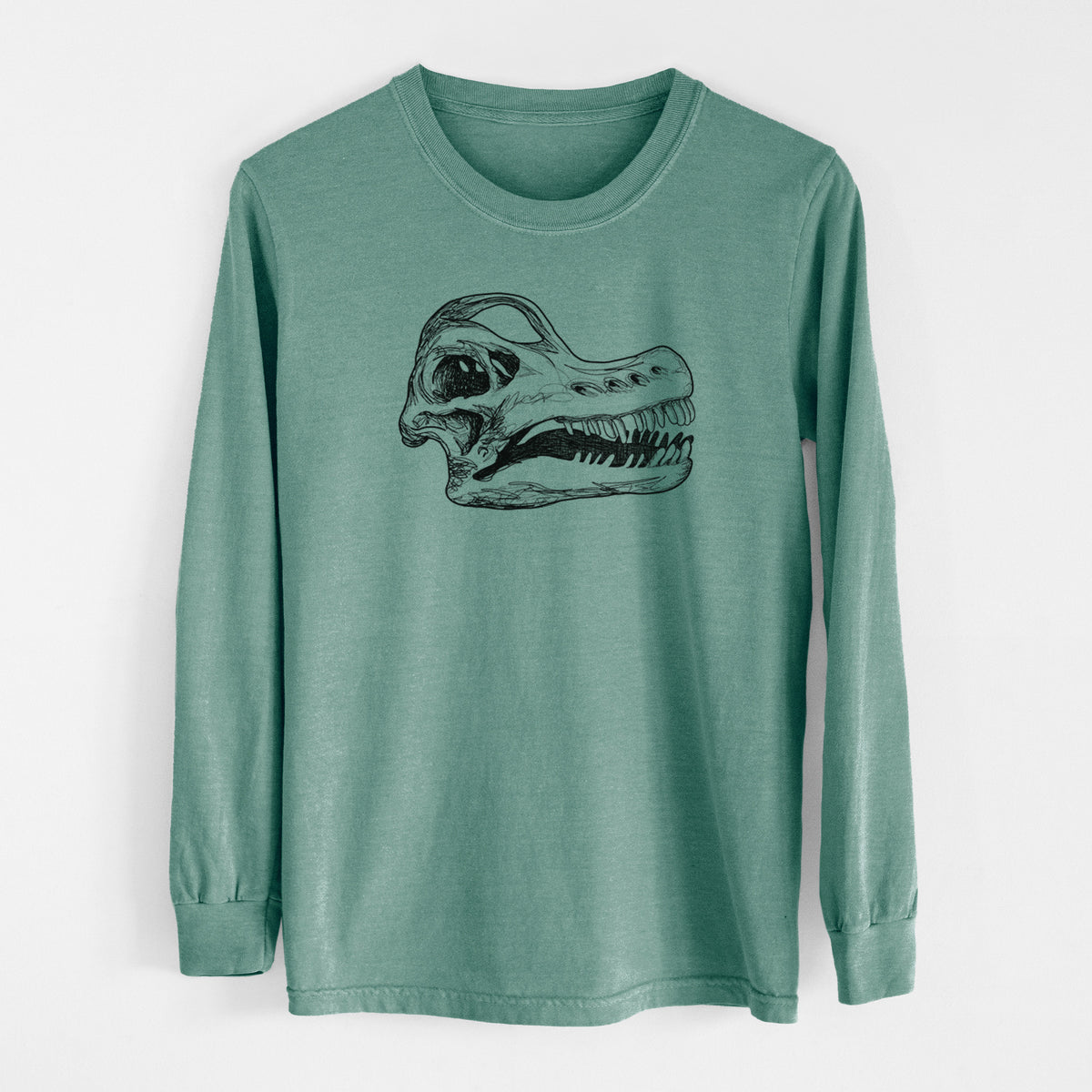 Pine green Comfort Colors long sleeve shirt laid flat, printed with a detailed black ink illustration of a Brachiosaurus skull.