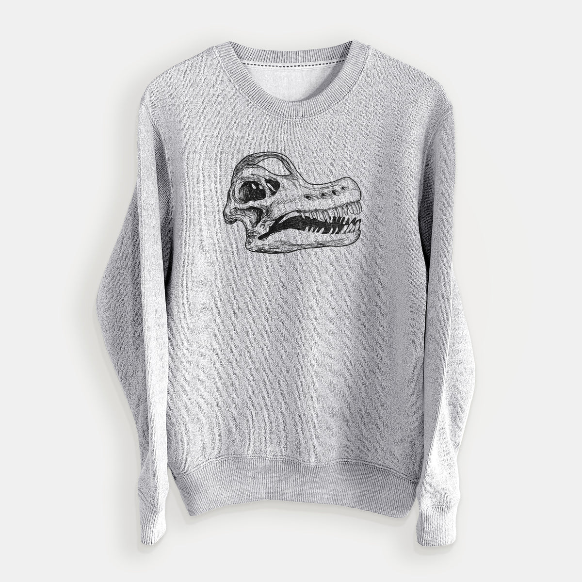 Salt and pepper knit sweatshirt laid flat, printed with a detailed black ink illustration of a Brachiosaurus skull.