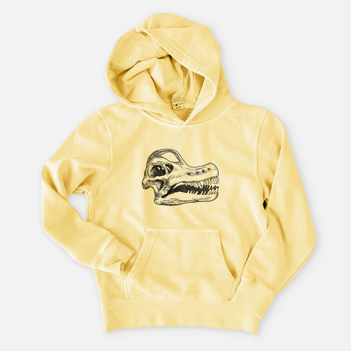 Pigment yellow youth pigment dyed hoodie laid flat, printed with a detailed black ink illustration of a Brachiosaurus skull.
