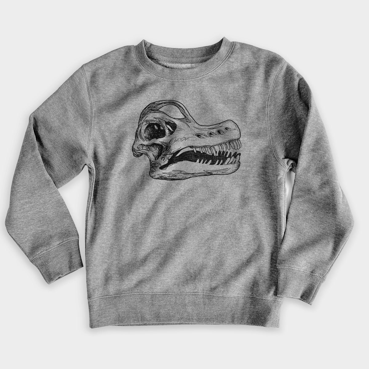 Nickel grey youth crewneck sweatshirt laid flat, printed with a detailed black ink illustration of a Brachiosaurus skull.