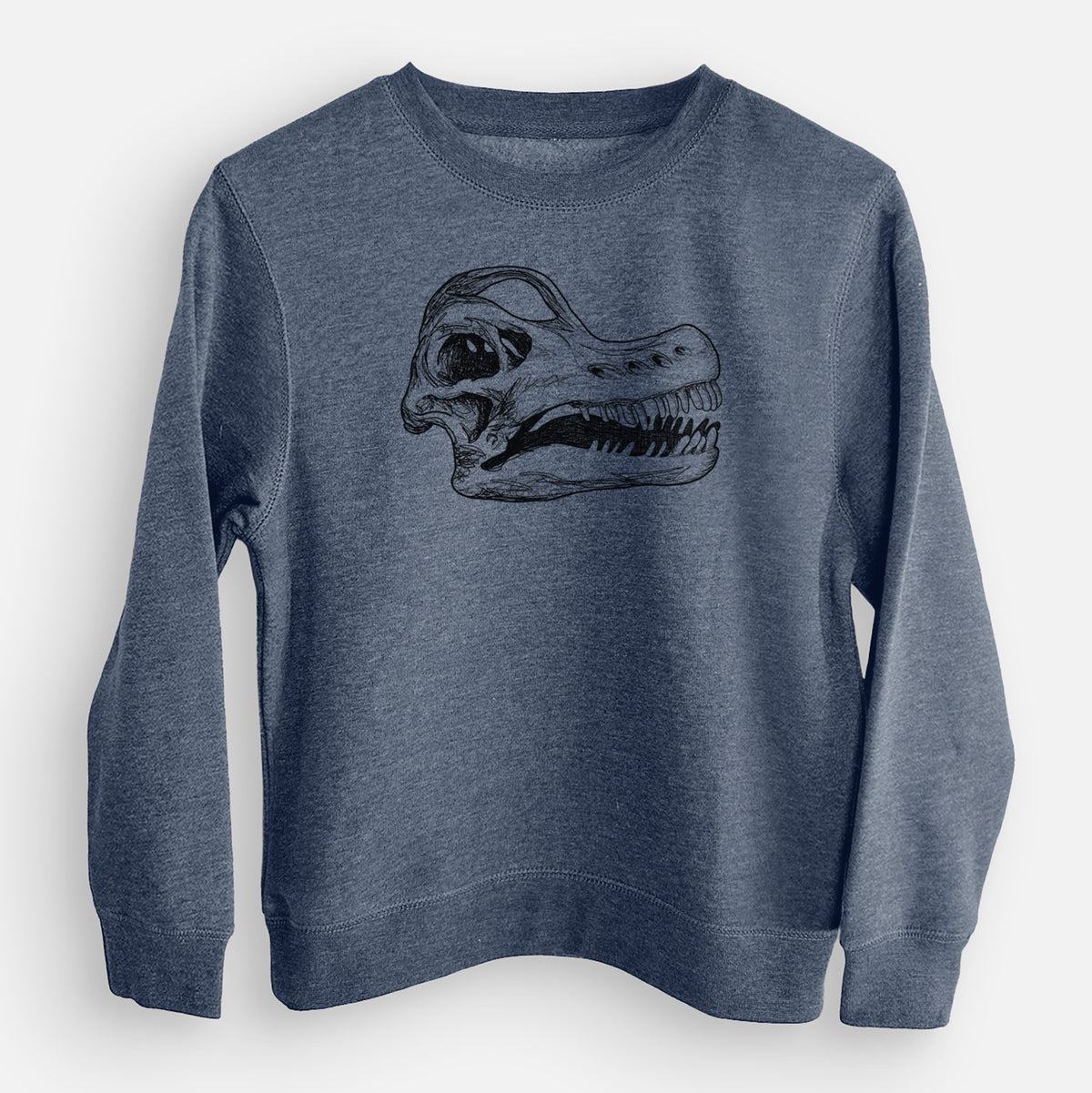 Storm blue youth crewneck sweatshirt laid flat, printed with a detailed black ink illustration of a Brachiosaurus skull.