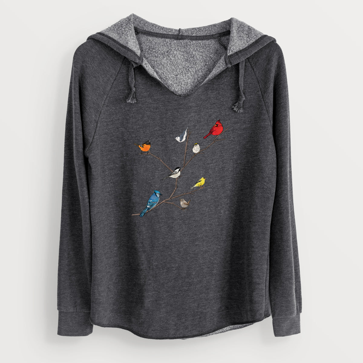 Charcoal grey women's Cali Wave hooded sweatshirt laid flat, printed with a full-color illustration of backyard birds, including a cardinal, blue jay, goldfinch and robin, perched on bare branches.